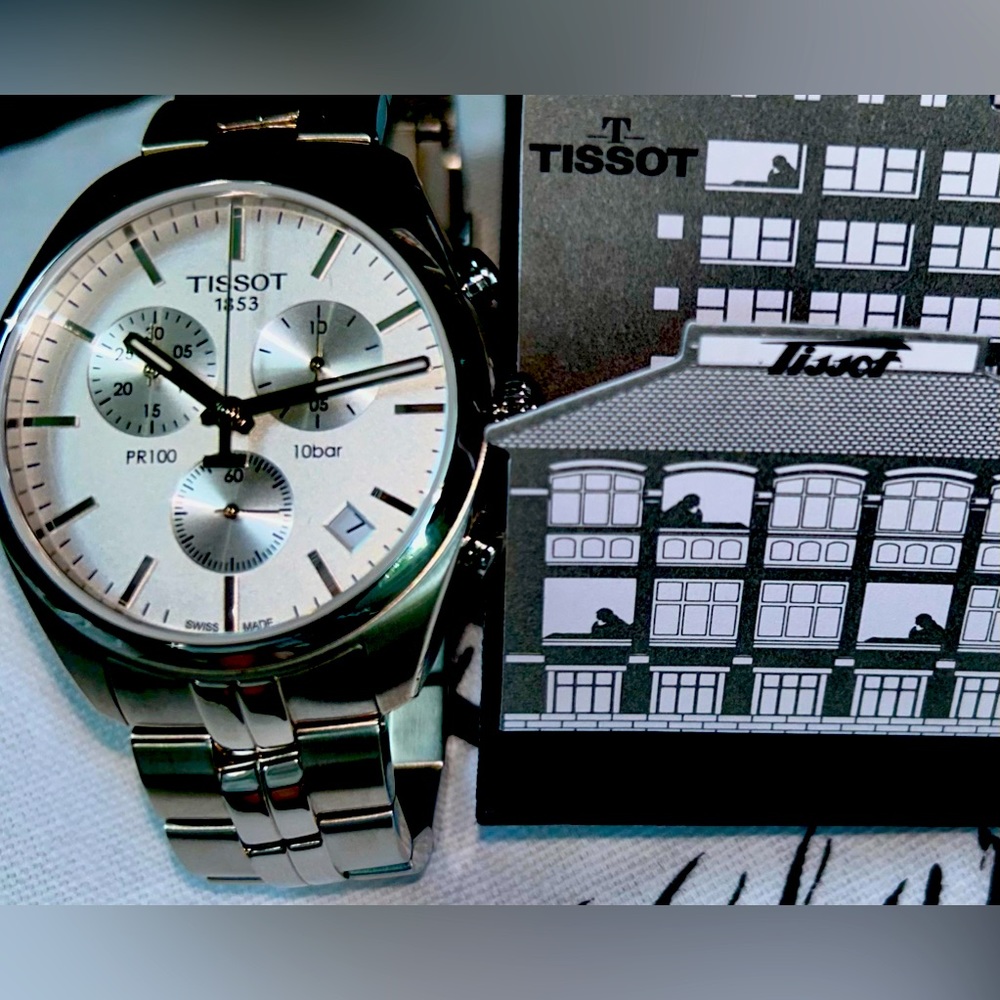 Tissot Swiss Mans watch NWT. Beautiful - great style.Lowest price on site